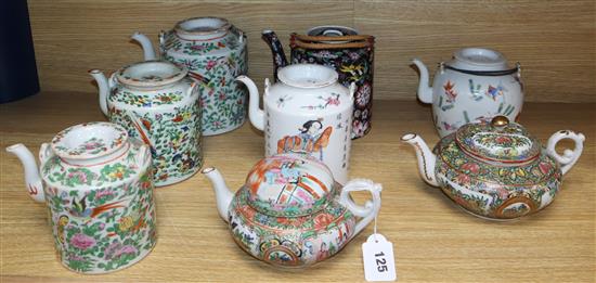 Eight Chinese famille teapots, 19th / 20th century